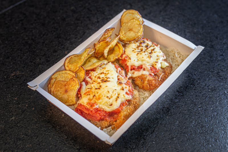 Chicken parmigiana with melted cheese and marinara